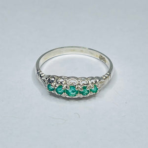 Sterling silver ring with emeralds