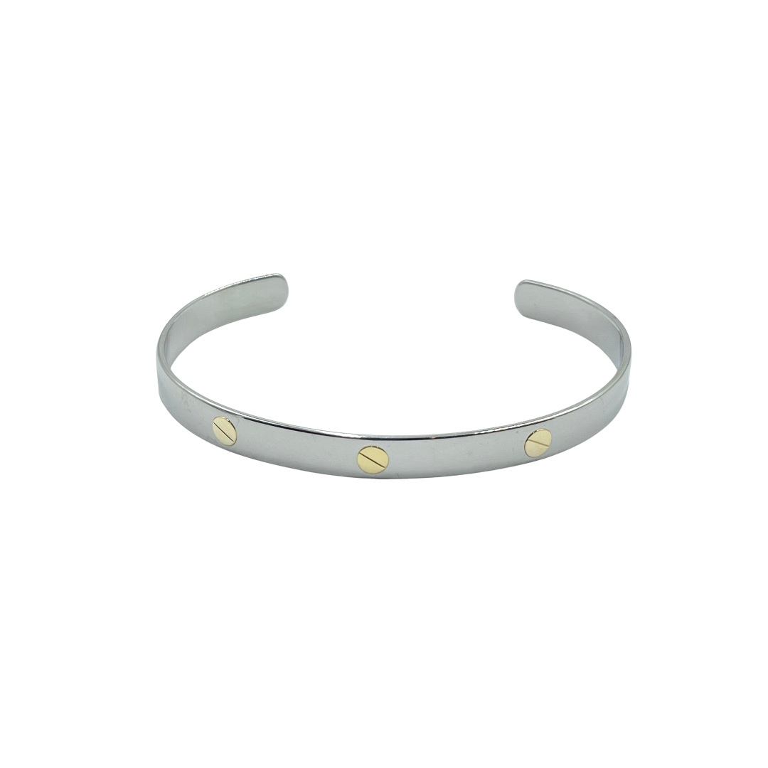 Stainless steel cuff with gold plated detail